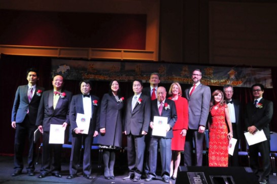 Director General Calvin Ho (5th from left); Illinois State Treasurer Michael Frerichs (4th from right), and Illinois Comptroller Leslie Munger (5th from right), with other officials and dignitaries.