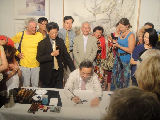 黃政務委員光男現場揮毫示範作畫