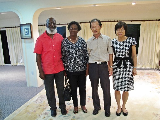 His Excellency Benjamin Ho and his wife hosted a dinner for Hon. Wilfred Elrington, Attorney General and Minister of Foreign Affairs, and his wife on August 14th at their residence.