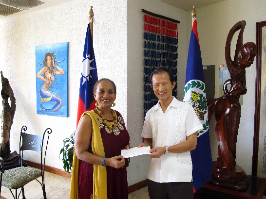His Excellency Benjamin Ho, Ambassador of the Republic of China (Taiwan) to Belize handed over a cheque of $40,000.00 BZD to Co-Chair of the National Celebrations Commission (NCC), Diane Haylock at the Bliss Centre for the Performing Arts on August 19, 2015. The sponsorship will go towards the preparation for celebrating the 34th Anniversary of Belize as an independent nation.  