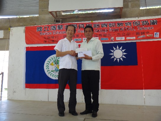 On behalf of the Forest Bureau, Council of Agriculture, Executive Yaun, Ambassador Benjamin Ho of the ROC (Taiwan) presented a check of USD 10,000 (20,000 BZD) to Executive Director of the Friend for Conservation and Development (FCD). The sponsorship will go toward helping safeguard the conservation work of the endangered parrot species of scarlet macaws.