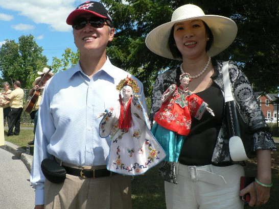 Taiwan Representative Dr. David Lee and Mrs. Lee attend the parade of Puppets Up! Festival in Almonte, 50 kilometers west of Ottawa