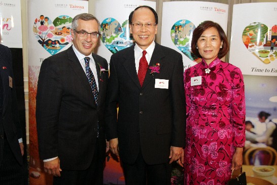 ROC (Taiwan) Representative Dr. C.K. Liu and Mrs. Liu welcome Tony Clement, President of Treasury Board