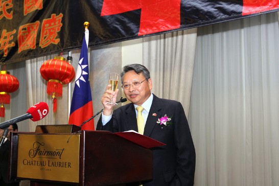 Representative Bruce Linghu raises his glass and toasts to the Republic of China (Taiwan)'s 103rd National Day