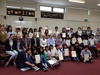 Representative Tseng, Eileen Morris and Andrew Basquille are pictured together with the graduating summer students 
