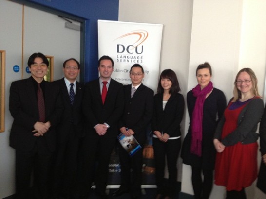 Representative Harry Tseng, Deputy John Lyons, and Mr. Donald Lu are pictured with teachers and students at DCU