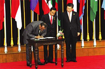 His Majesty King Mswati III signing the Bandung Message 2015