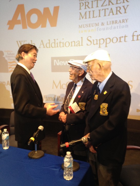 Representative Lyushun Shen pays respect to two WWII veterans: Lt. Col. Richard Cole (center), co-pilot of  General Jimmy Doolittle, and Lt. Col. Edward Saylor (right), engineer of Plane 15 on the Doolittle Raid.