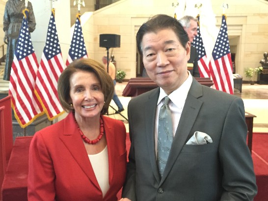 Representative Lyushun Shen, the only invited foreign envoy, and the U.S. House Democratic Leader Nancy Pelosi (D-CA), on the occasion of the Congressional Gold Medal Ceremony in honor of the Doolittle Tokyo Raiders on April 15, 2015.
