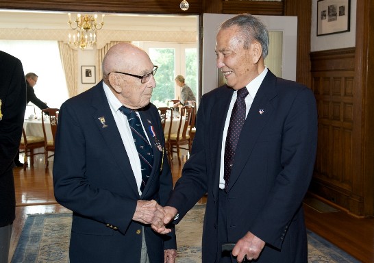 Lieutenant-Colonel Richard Cole and General Patrick Chen greet one another at a luncheon held in their honor at the Twin Oaks Estate. General Chen, a member of the Flying Tigers, who later became Deputy Commander-in-Chief of the Republic of China Air Force, and while Lt.-Col. Cole was co-pilot to Colonel James Doolittle for the Doolittle Tokyo Raid, the first operation to strike the Japanese homeland.
