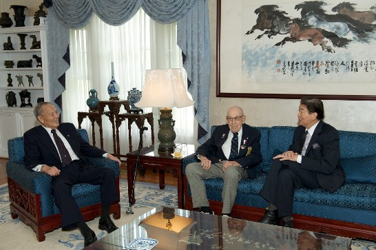 Ambassador Lyushun Shen chats with Lieutenant-Colonel Richard Cole and General Patrick Chen at the Twin Oaks Estate. Both men are veterans of the Chinese theater in World War II. 