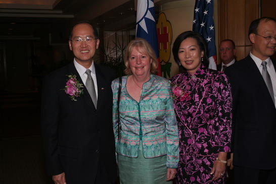 TECRO Representative David Tawei Lee and Mrs. Lee welcome Ms. Barbara J. Schrage, AIT Trustee and Managing Director at the 2006 Double Tenth National Day reception party.
