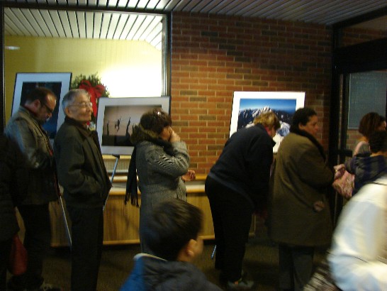 Crowd admires "Taiwan Sublime" photographs at Framingham Public Library