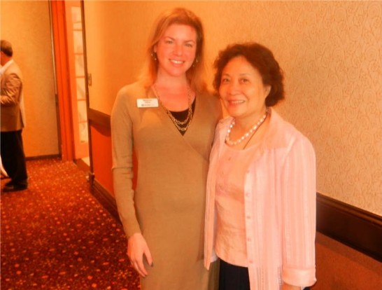  Austin College President Marjorie Hass and Director Sarah Wu pose for a picture.