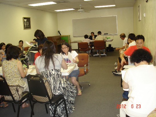 Secretary Chang of TECO in Houston serves the community by processing consular needs at the Dallas Chinese Cultural Center