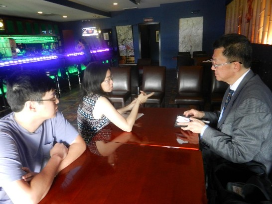 Director General Liao and Chairperson Chen of the Houston Song Nian Senior Association pictured together