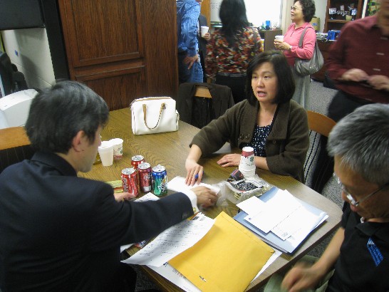 廖處長東周與陳組長彥夆協助奧華協會林會長盛美辦理土地授權文件證明