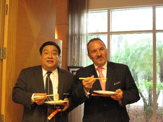Mr. Jose Marti, General Manager  and Mr. OscarSalgado, Director of Food and Beverage of Food of InterContinental at Doral tasting Taiwanes delicacies.