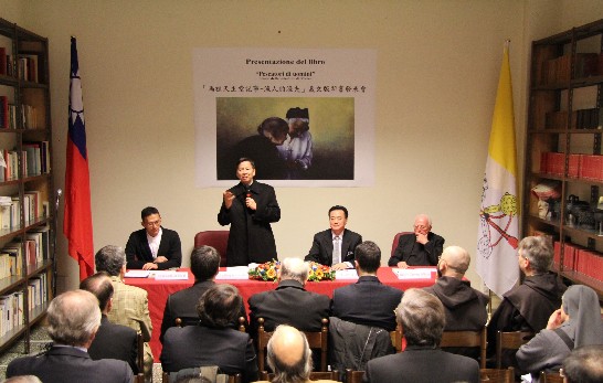 Archbishop Hon addresses the public gathered for the book presentation