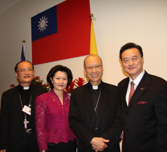 Ambassador and Mrs. Larry Wang (1st from right and 2nd from left), with Cardinal John Tong Hon (2nd from right), and Bishop Martin Su (1st from left).
