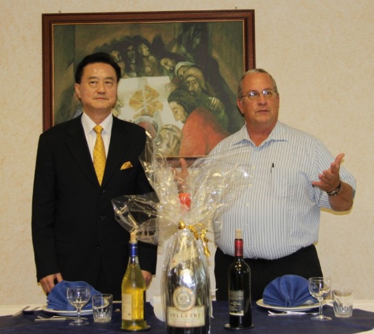 Fr. Gregory Gay (1st from right) introduces Ambassador Larry Wang (1st from left) to his religious brothers before lunch.