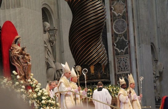 The four newly ordained bishops stand in front of the Altar during the eucharistic ceremony inside St. Peter’s Basilica.