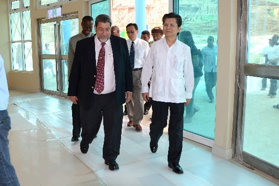 H.E. Ambassador Weber V. B. Shih and SVG Prime Minister Dr. the Hon. Ralph E. Gonsalves toured the Terminal Building after the Handing-over Ceremony on December 30, 2013.