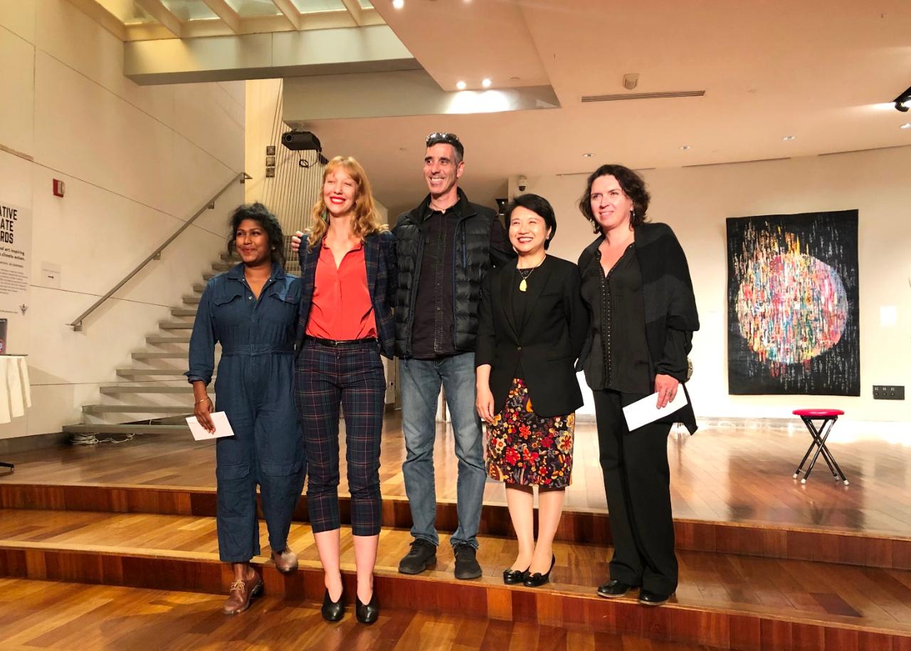 From left to right: Thimali Kodikara, member of the jury, Tara DePorte, Founder and Executive Director of the Human Impacts Institute, Russell Ritell, first prize winner, Ambassador Lily Hsu, and Natalya Khorover Aikens, third prize winner.