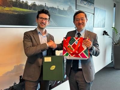 Ambassador Roy Chun Lee met with Leuven Mayor Mohamed Ridouani to promote city exchanges between Taiwan and Belgium
