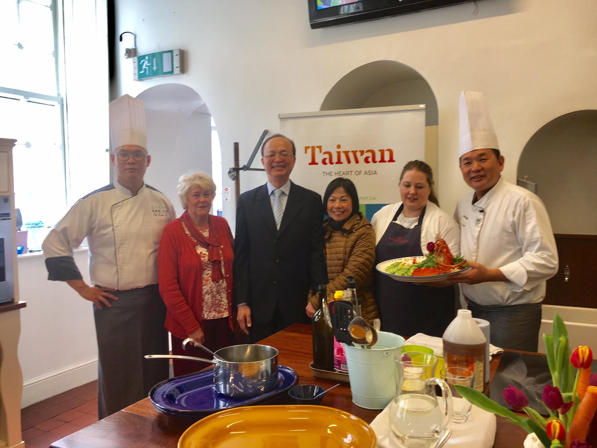 Representative and Mrs. Tu (centre), Professor Chen (right) and Mr. Li (left) with the head chef of the Howth Castle Cookery School