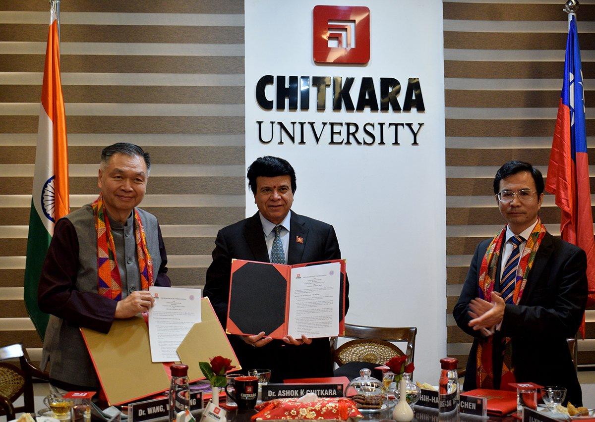 Witnessed by Chih-Hao Jack Chen (right), Deputy Representative of Taipei Economic and Cultural Center in India, the Memorandum of Understanding regarding the establishment of Taiwan Education Center at Chitkara University in Punjab, India is exchanged between Dr. Wang Wei-Chung (left), Director, Center for India Studies, National Tsing Hua University and Dr. Ashok K. Chitkara, Chancellor of Chitkara University on Dec. 12, 2019.