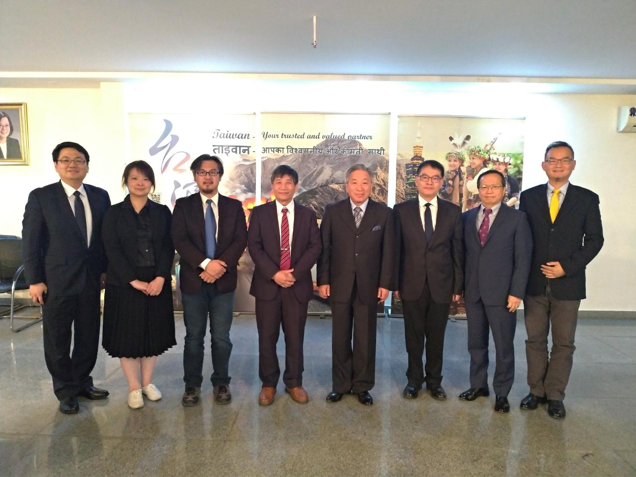 Mr. Cheng (Right 5) and the delegation called on Amb. Tien (Right 4) at TECC, accompanied by staff of TECC.