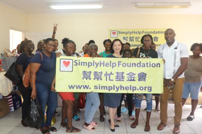Amb. Fiona Fan with Minister Orando Brewster handed over the resources donated by SimplyHelp Foundation and a Taiwanese Non-Profit Organization
