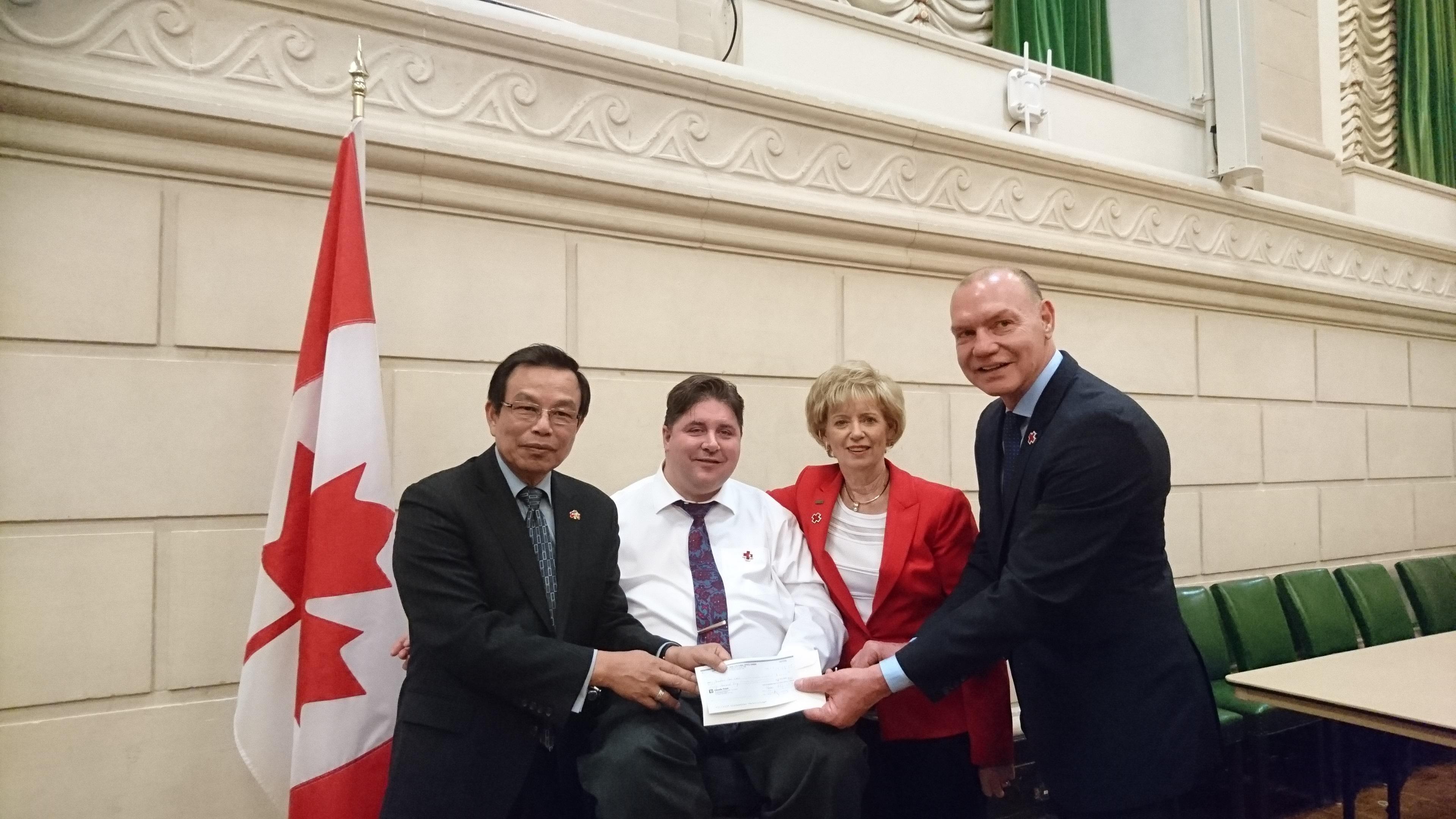 Left to Right: Rong-chuan Wu, Representative of the Taipei Economic and Cultural Office in Canada, the Honourable Kent Hehr, Alberta resident and Minister of Veteran Affairs for Canada, and the Honourable Member of Parliament Judy Sgro (the Chair of Canada-Taiwan Parliamentary Friendship Group)