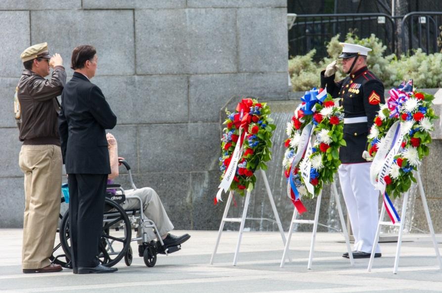 Representative Lyushun Shen joins the representatives of the Pacific Theater allies from Canada, France, India, Mexico, Mongolia, the Netherlands, Philippines, Russia, and United Kingdom, along with U.S. veterans, to present wreaths at the National WWII Memorial on September 2, 2015.