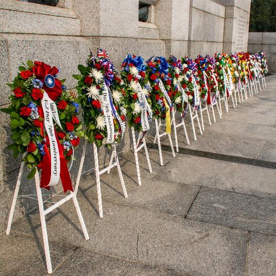 Our wreath with the national emblem is placed with those from other Pacific Theater allies in front of the wall at the National WWII Memorial on September 2, 2015.