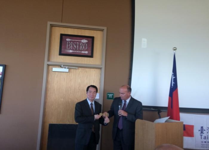 Mayor of Youngstown, Ohio, John A. McNally (left) presents a Key to the City of Youngstown to Director General Calvin Ho