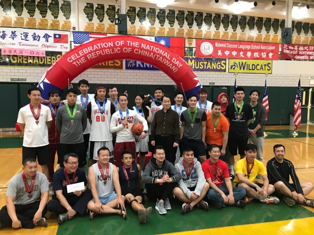 Group photo of D.G. Calvin Ho and basketball winners at Closing Ceremony.
