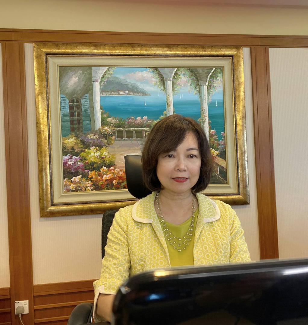 Representative Anne Hung delivers a speech in the  online  conference.