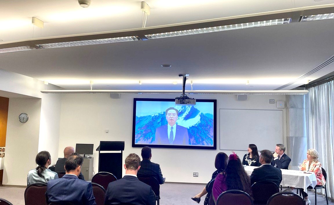 MOFA Minister Joseph Wu pre-recorded congratulatory remarks to be played during the reception