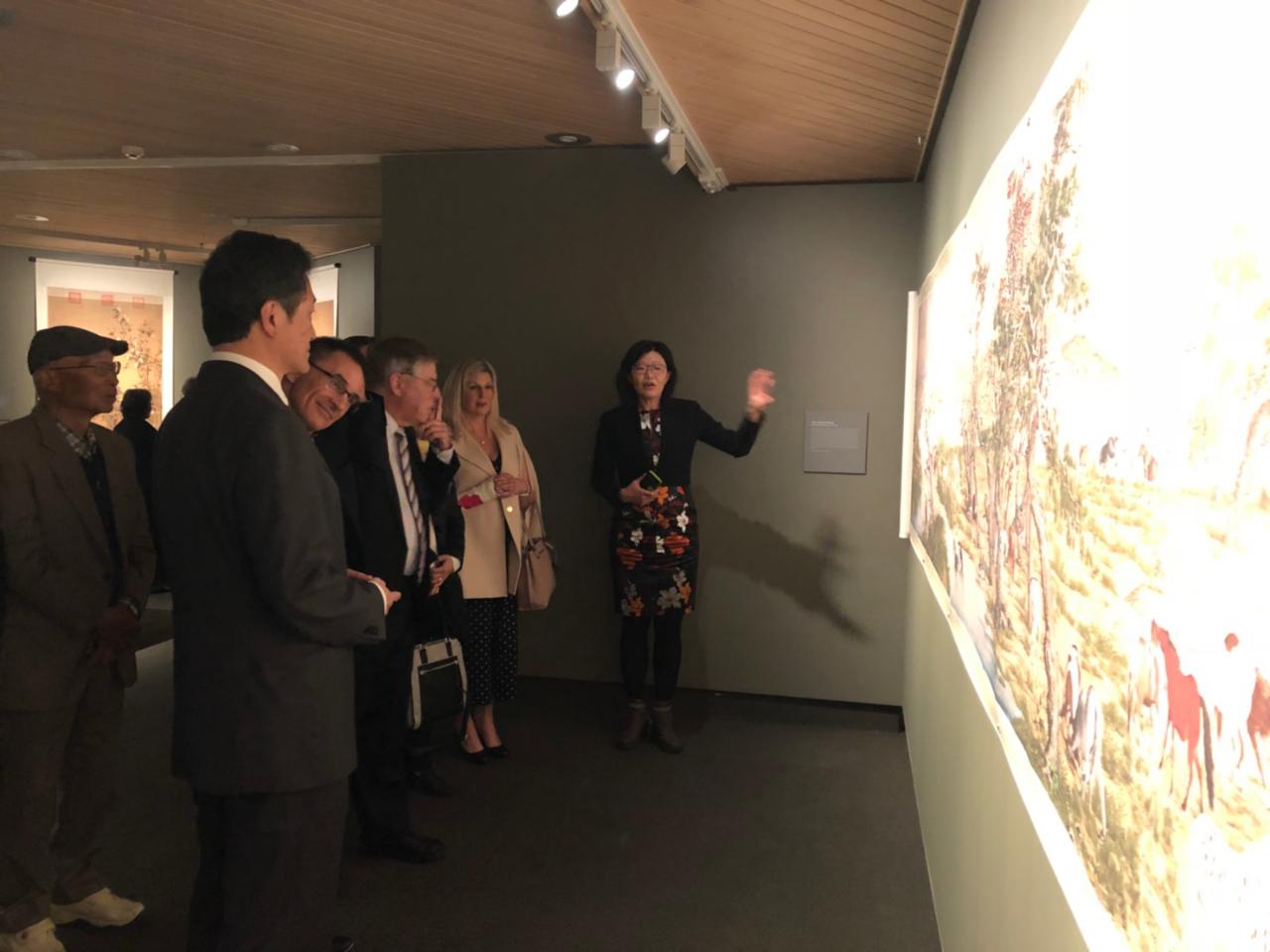 Distinguished guests were listening with full attention to the story behind this masterpiece.