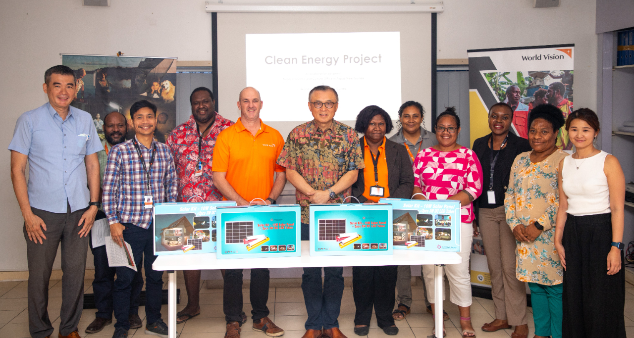 Photo2_Solar_Kits_Donation_Ambassador_Wang_WVPNG_ND_Chris_Jensen_and_WV_staff