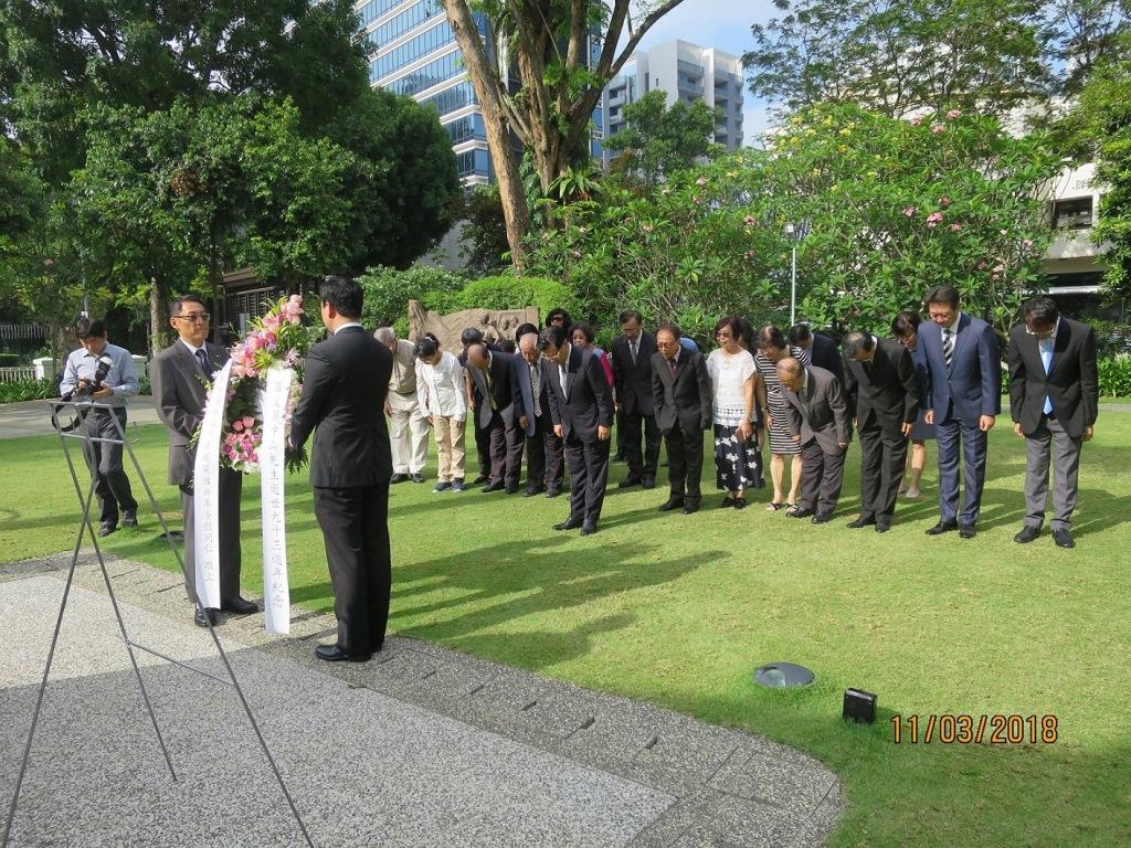 Representative Francis Liang offering a flower wreath at the memorial service to commemorate the 93rd death anniversary of Dr. Sun Yat Sen, founding father of the Republic of China, at the Sun Yat Sen Nanyang Memorial Hall.