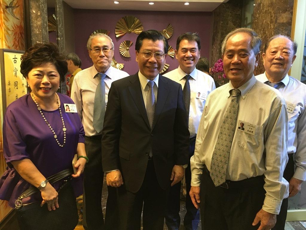 Representative Francis Liang (front, center) receiving a warm welcome on his arrival at the anniversary celebration.